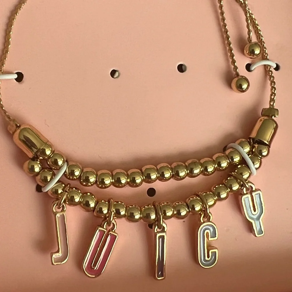 NWT💍Juicy Couture Gold Ton Bead with “Juicy”Enamel Charm Bracelet